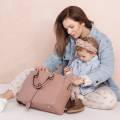 joissy-mila-torba-do-wozka-dla-mamy-pearl-pink-modelka-dziecko.jpg