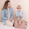 joissy-mila-torba-do-wozka-dla-mamy-pearl-pink-modelka-dziecko-2.jpg